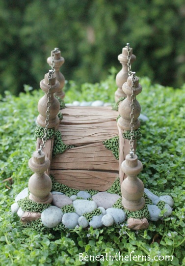 Miniature fairy garden bridge by beneath the ferns front view