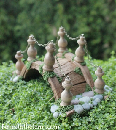 Miniature fairy garden bridge by beneath the ferns